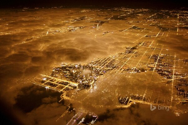 Top view of Chicago through the clouds