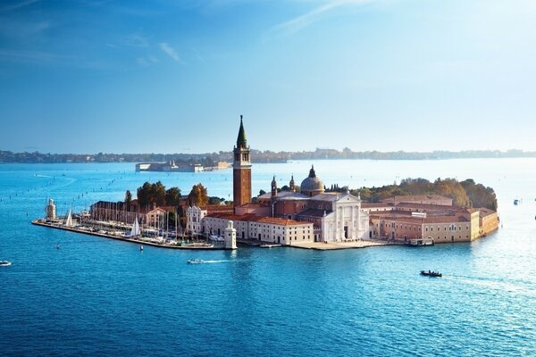 An island with a cathedral on the ocean