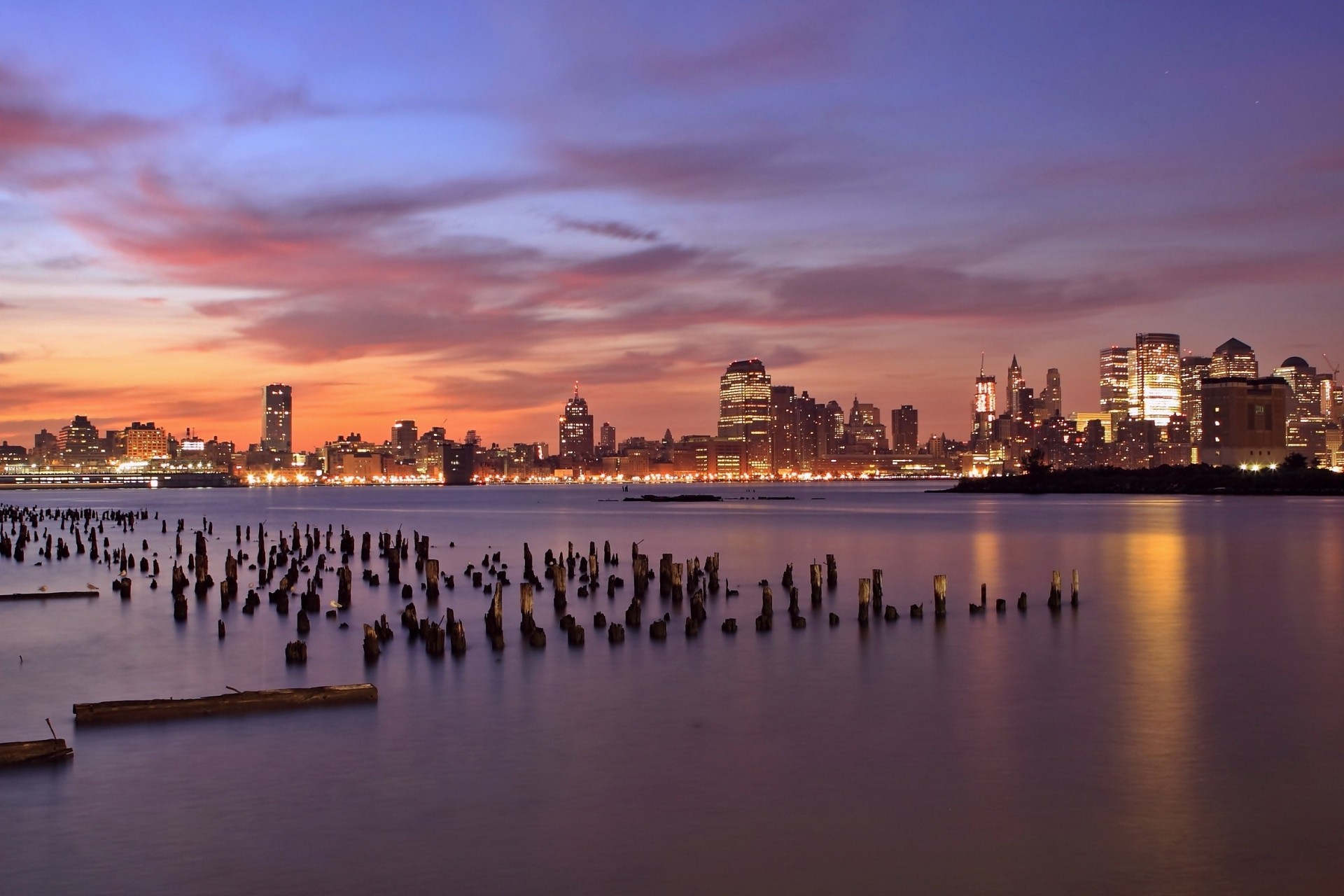 lights jersey city river clouds sunset orange skyscraper night sky hudson united states new jersey