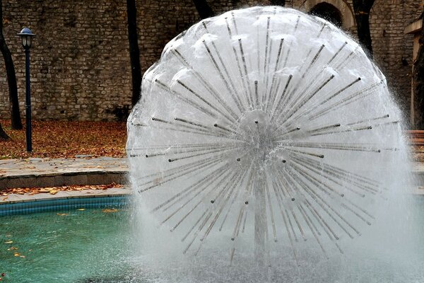 City fountain in the shape of a dandelion