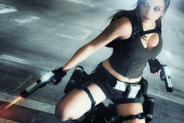 A brunette girl in the image of Lara Croft