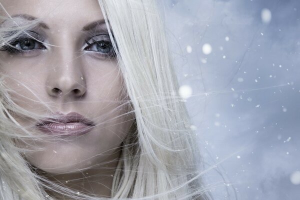 Blonde face with developing hair close-up