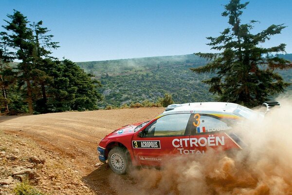 Racing car in clouds of dust