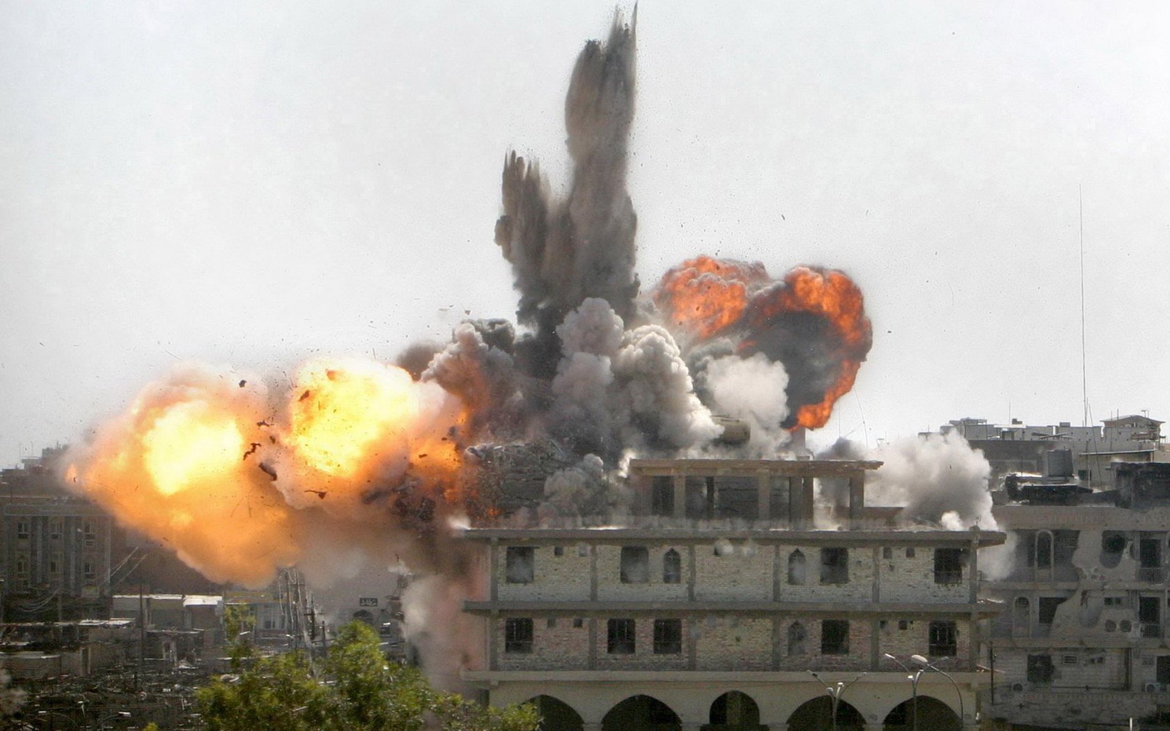 the shell hit a cloud of dust the building the explosion fire ruin