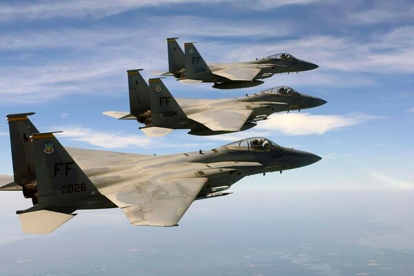 Three military fighter planes