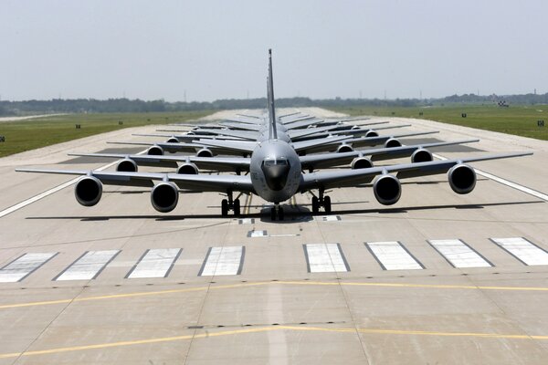 Planes lined up on the runway