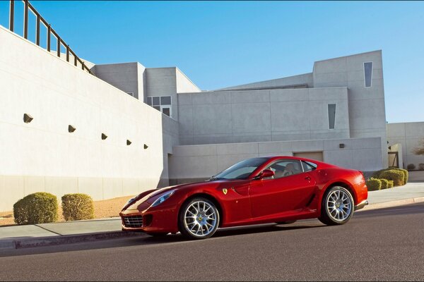 A red Ferrari in an urban setting