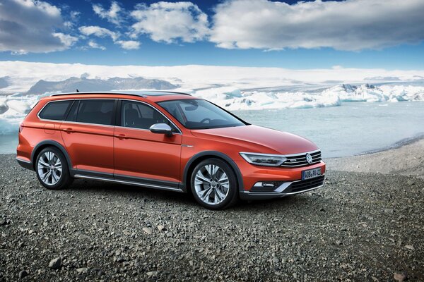 Red Volkswagen Passat on the sky background