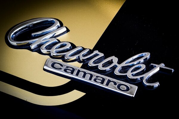 Silver and gold Chevrolet Camaro emblem