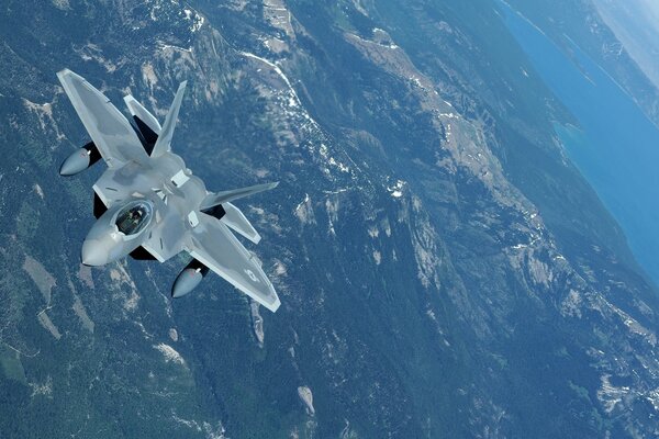 f_22 fighter jet in the sky over Hawaii