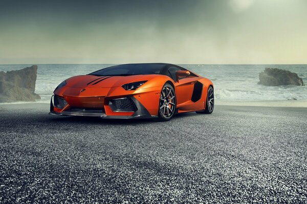 Lamborghini on the shore of the undulating sea