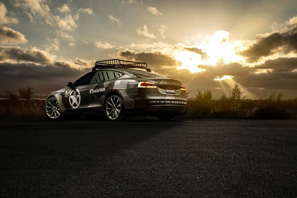 Tesla car in the sunset