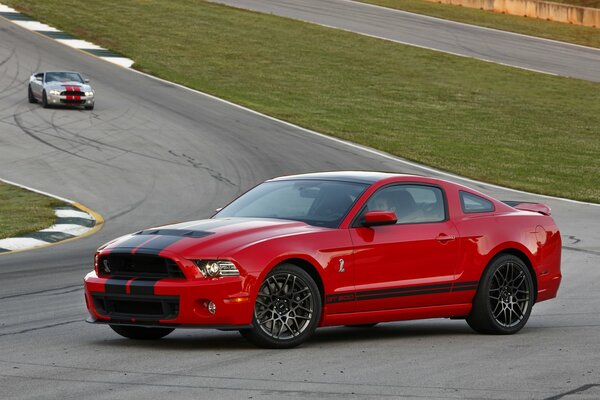 Red mustang on the race track