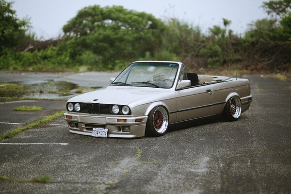 Gray BMW convertible stand on the asphalt