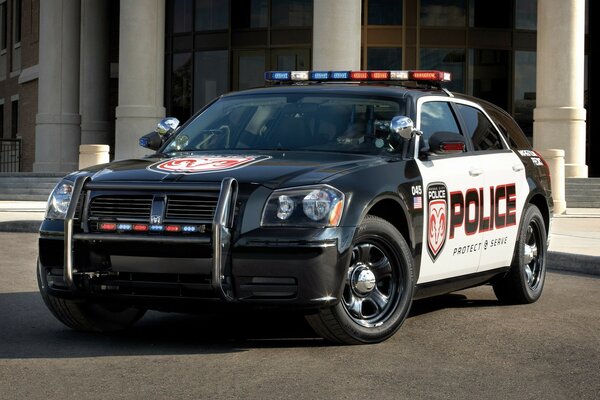 Dodge police car with flashing lights