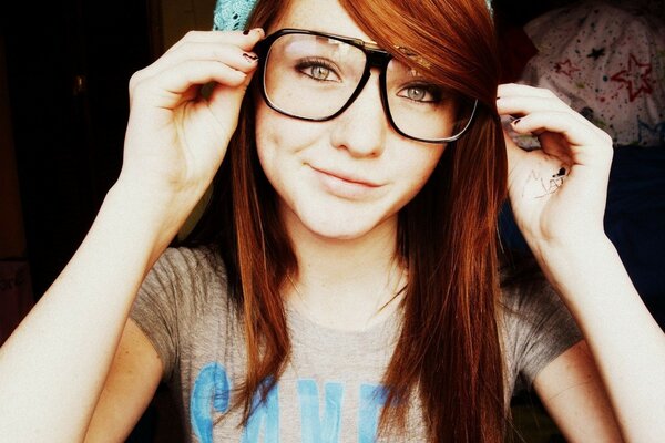 Teen girl in glasses and hat