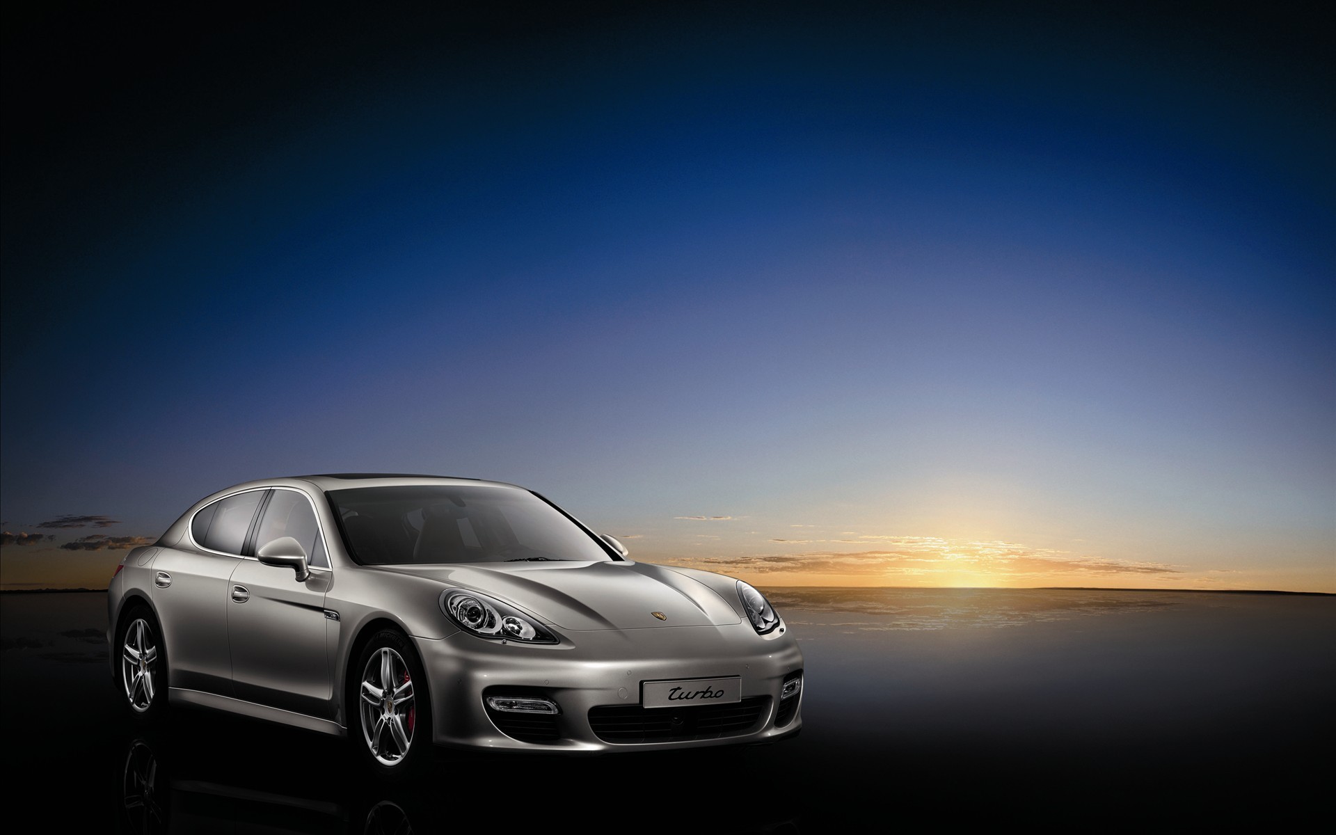 porsche argento tramonto