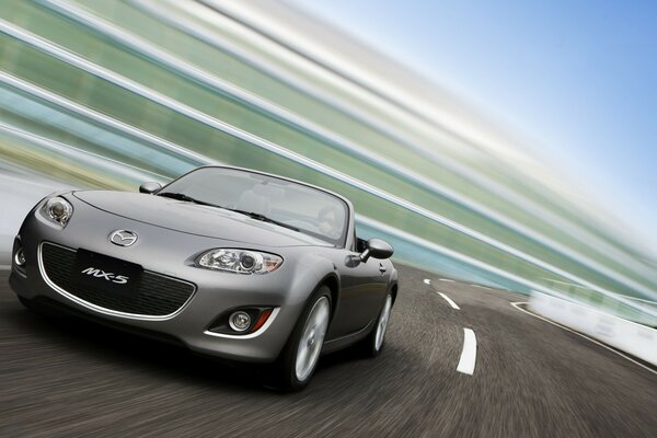 High speed from a sporty gray Mazda