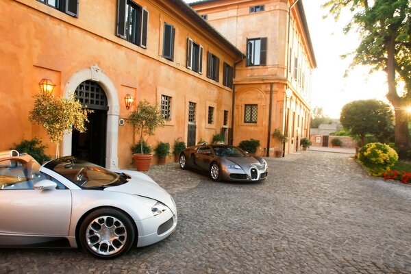 Sporty bugatti on the background of a beautiful house