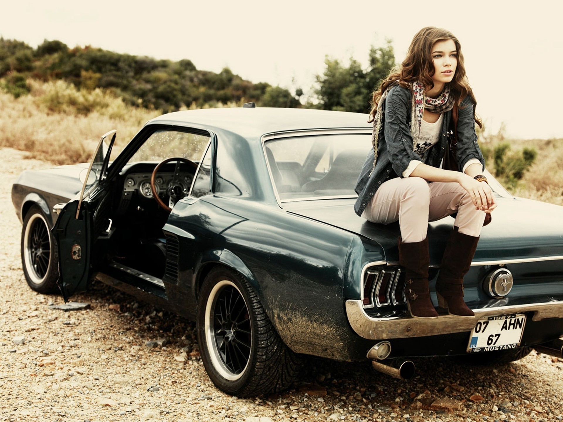 a woman ford girl brunette vehicles mustang grey