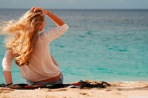 Girl with long hair on the beach