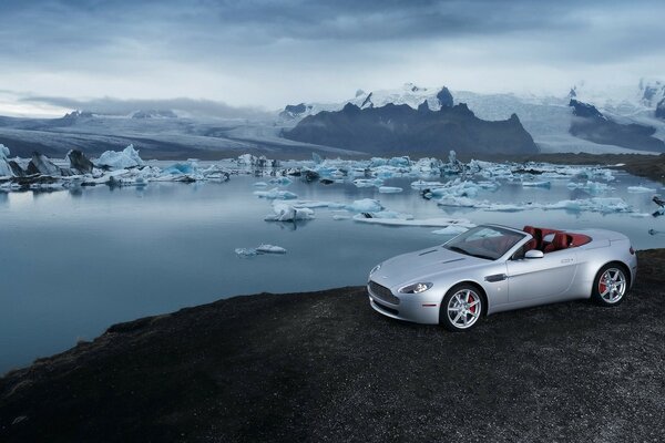 Roadster on the background of the ocean with icebergs