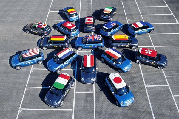 Minicoopers with flags of different countries
