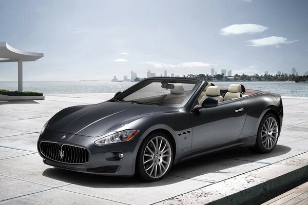 Maserati convertible on the seashore