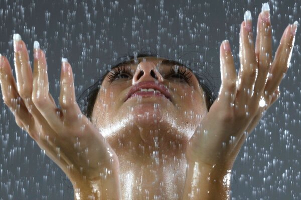Beautiful photo of a woman in the rain