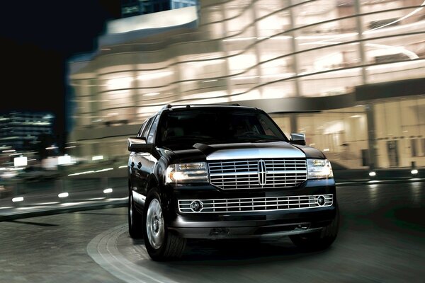 Black Lincoln navigator in the night city