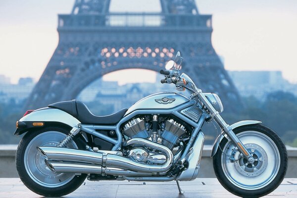 Silver Harley Davidson on the background of the Eiffel Tower