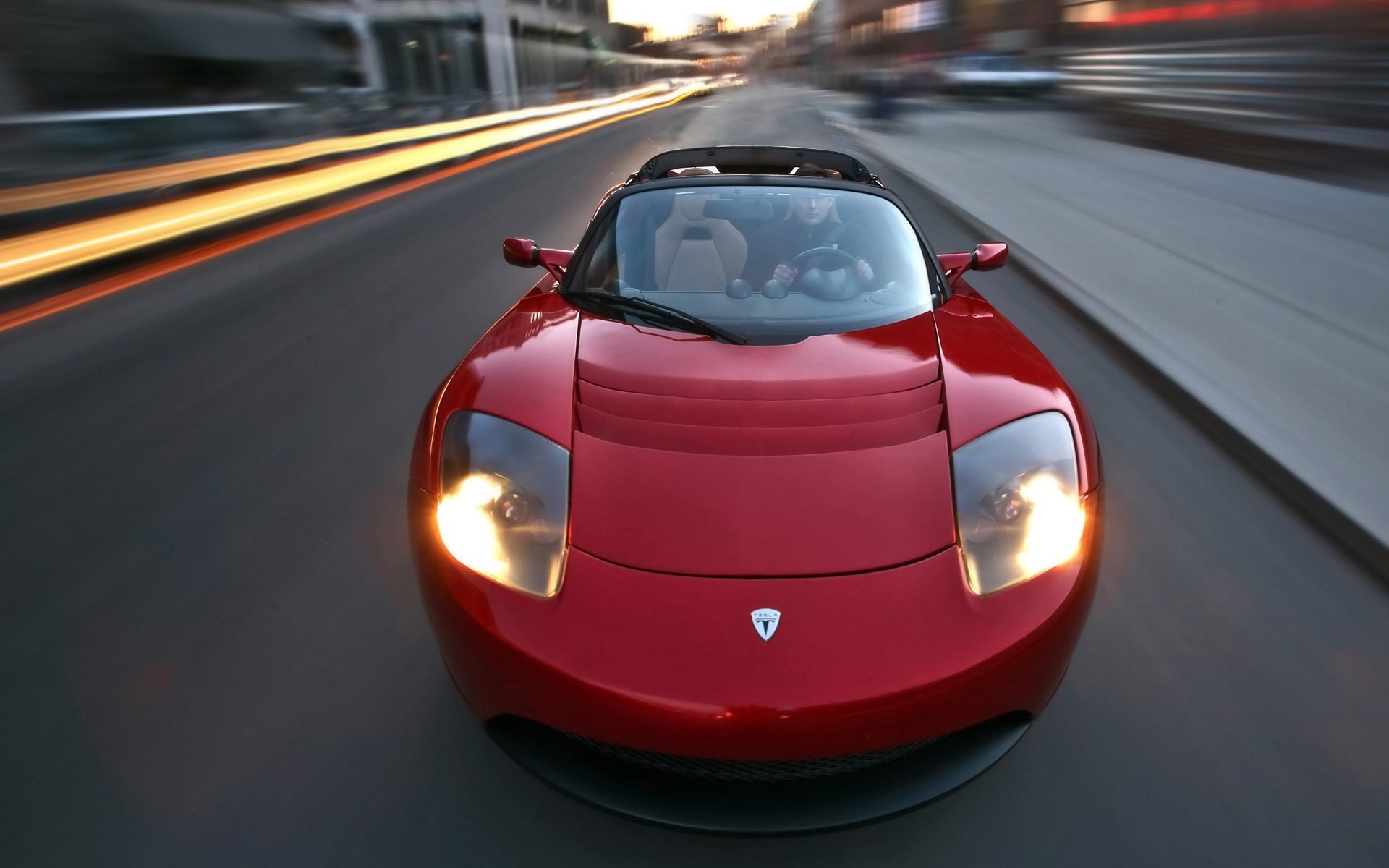 tesla roadster rouge route vitesse mâle