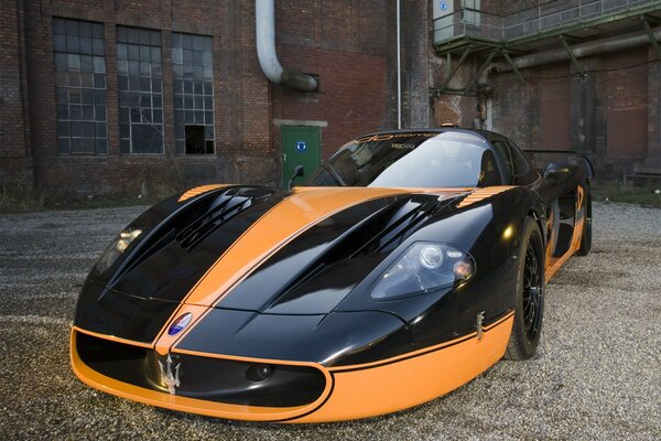 Maserati car in black and orange color