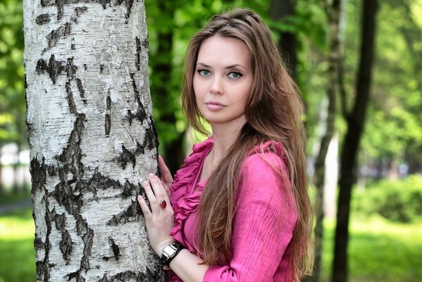 Oksana malakhova dans sa jeunesse avec les cheveux longs