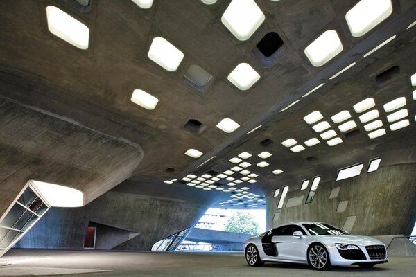 A beautiful Audi r8 is in the hangar