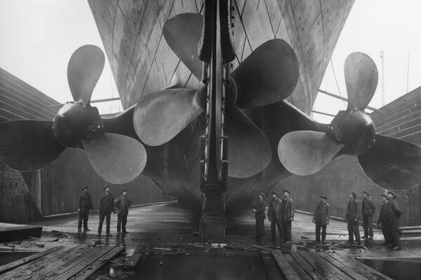 Black and white photo with the image of the ship s propellers