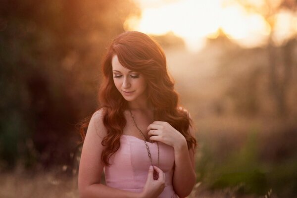 Beautiful girl on the background of nature