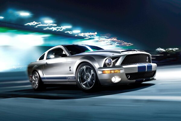 Ford shelby GT500KR rides at night at speed, electric light