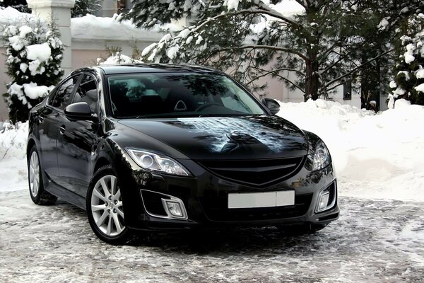 Batman arrived at Mazda 6 in winter