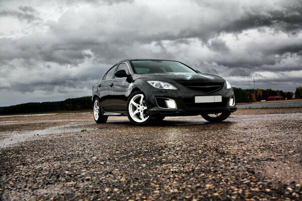 Advertising photo of a car against the sky