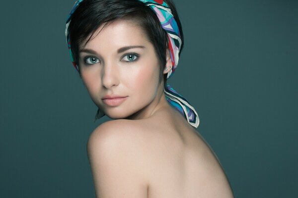 Naked brunette girl in a headscarf