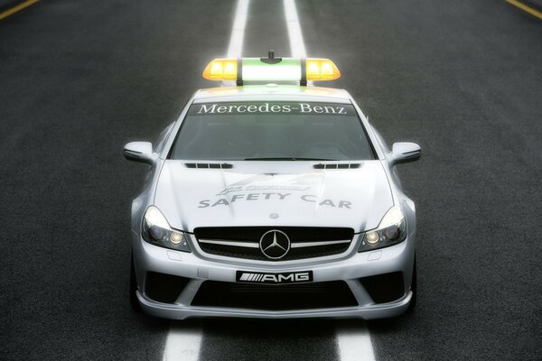 Sporty silver Mercedes on the track