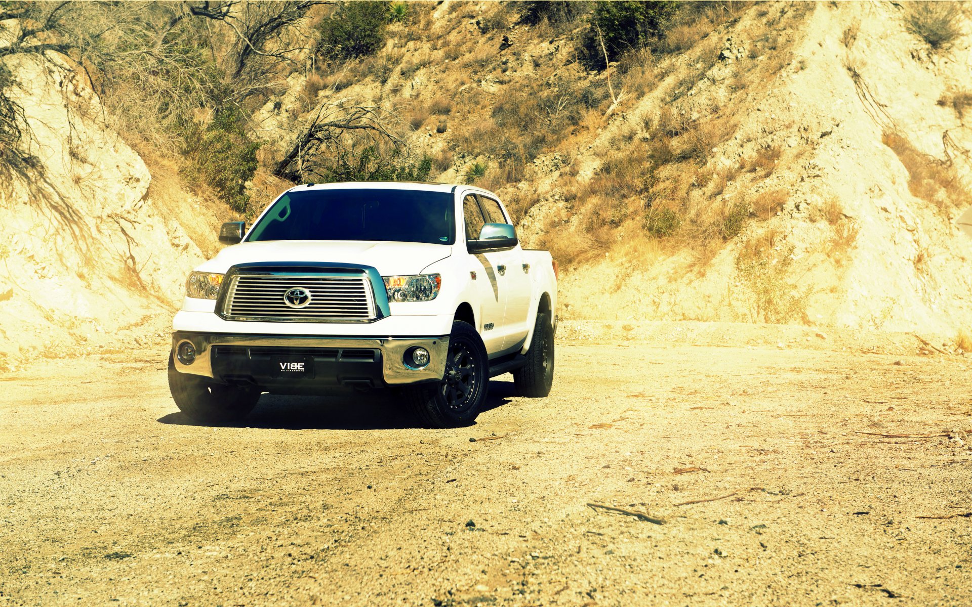 toyota tundra white front toyota pickup truck desert