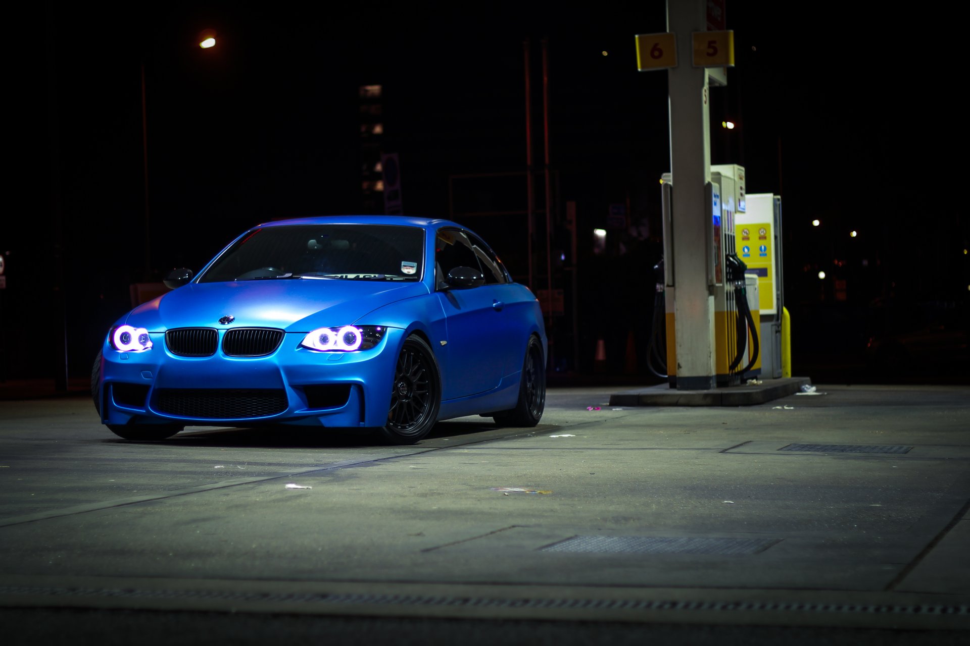 bmw 335i e93 blue bmw convertible refueling