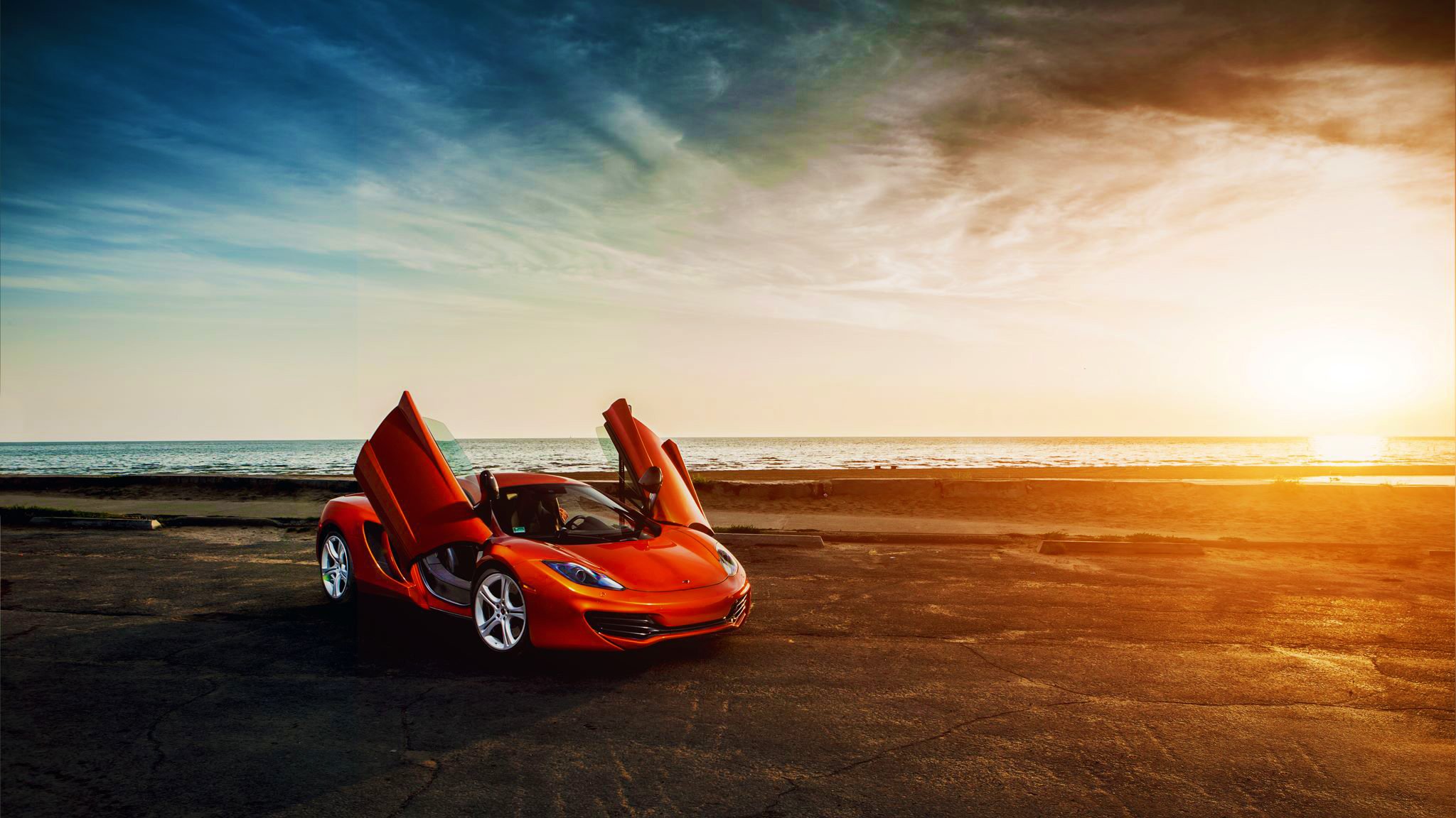 mclaren mp4-12c arancione supercar porte mare tramonto cielo nuvola bellezza anteriore