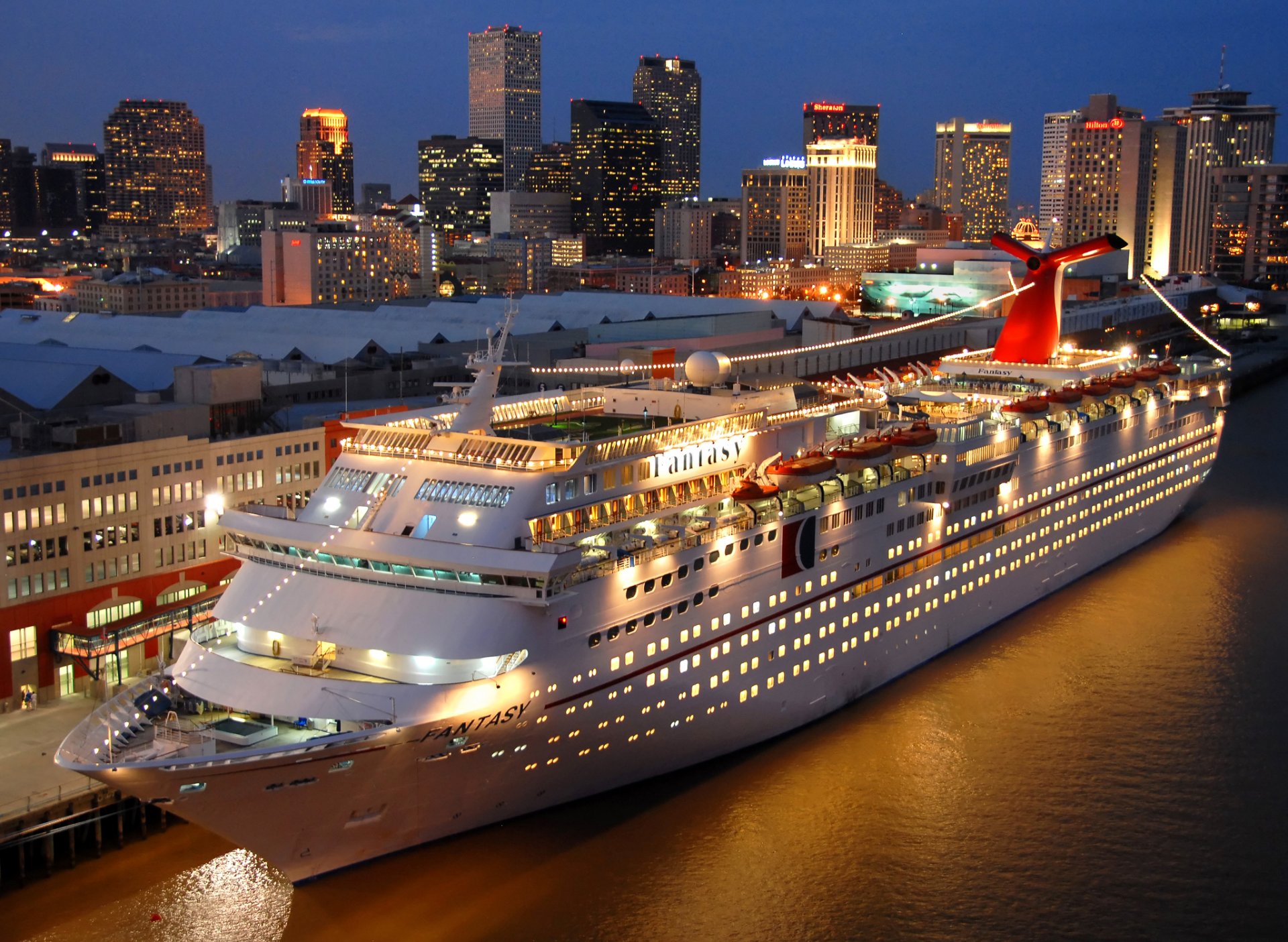 hip cruise ship pier night carnival fantasy photo