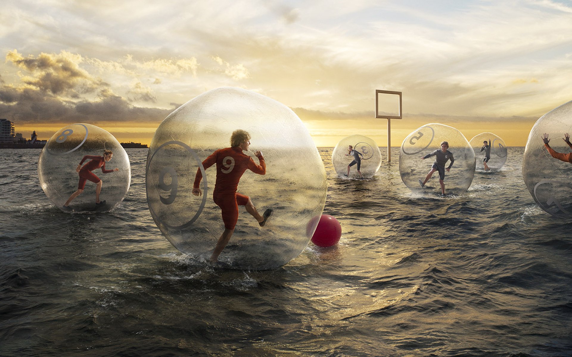 fútbol en el agua bolas con aire chorros agua juego equipo mar nubes puesta de sol bola broma