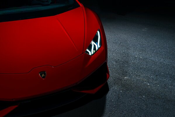 Red lamborghini on a dark background