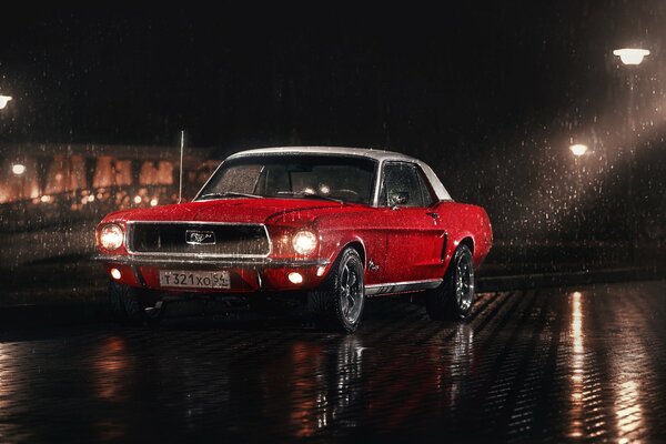 Red FRRD mustang in the rain