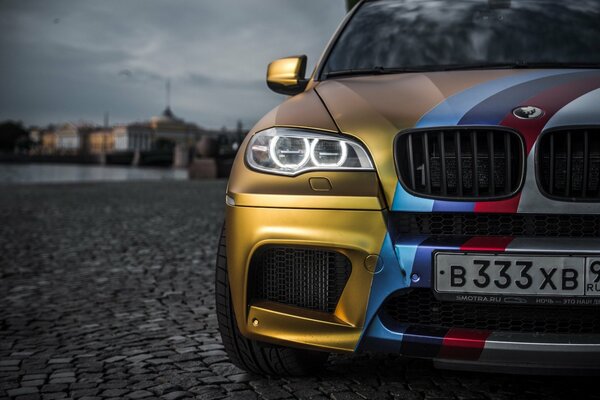 Fast bmw x5 gold color car